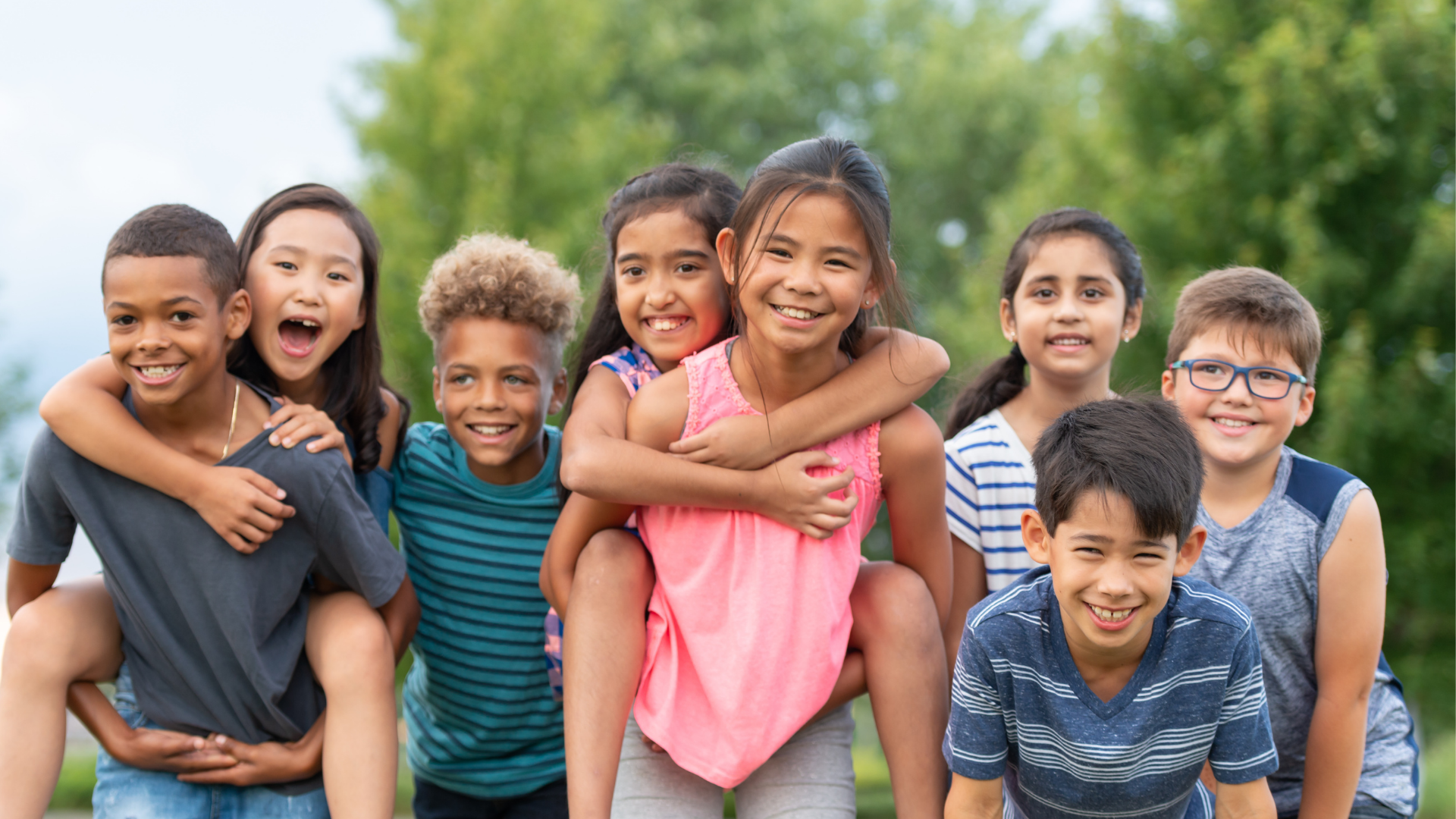 Group of smiling kids outdoors