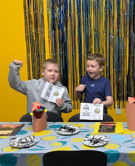 Kids celebrating at the Kids Adventure Club